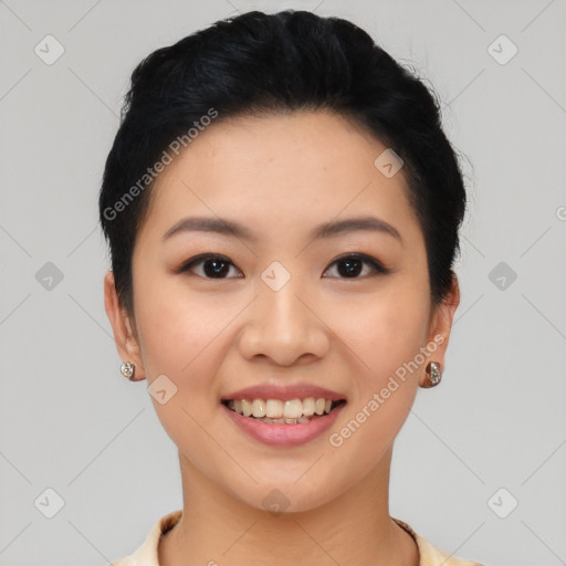 Joyful asian young-adult female with short  black hair and brown eyes