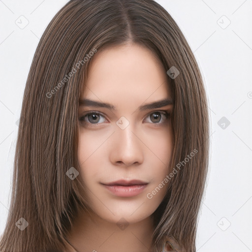 Neutral white young-adult female with long  brown hair and brown eyes