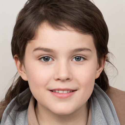 Joyful white child female with medium  brown hair and brown eyes