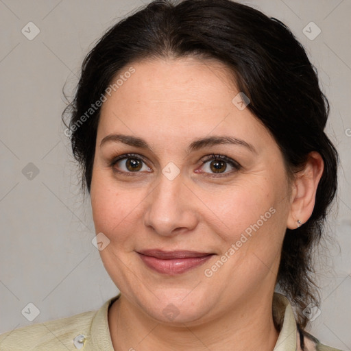 Joyful white adult female with medium  brown hair and brown eyes