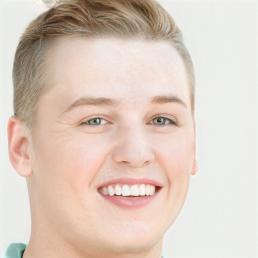 Joyful white young-adult female with short  brown hair and blue eyes