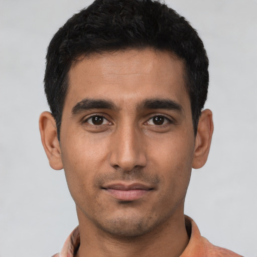 Neutral latino young-adult male with short  black hair and brown eyes