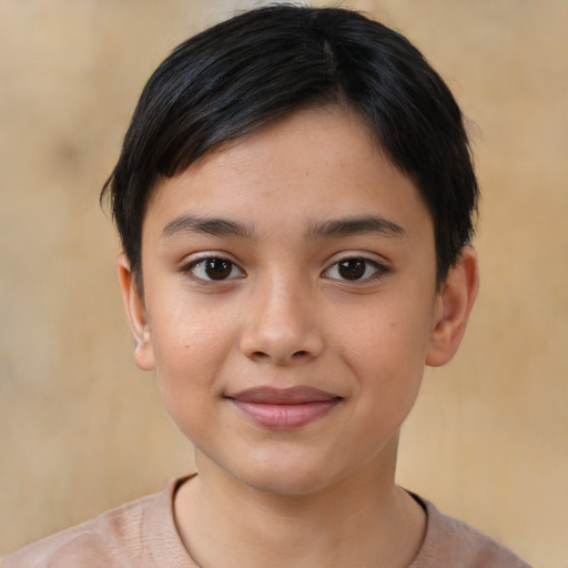 Joyful latino child female with short  brown hair and brown eyes