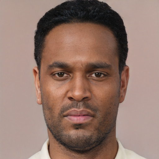 Neutral black young-adult male with short  black hair and brown eyes