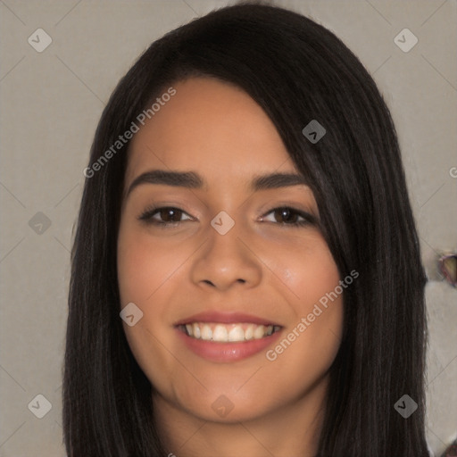 Joyful latino young-adult female with long  black hair and brown eyes