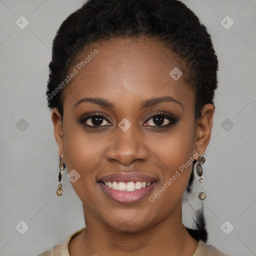 Joyful black young-adult female with short  brown hair and brown eyes