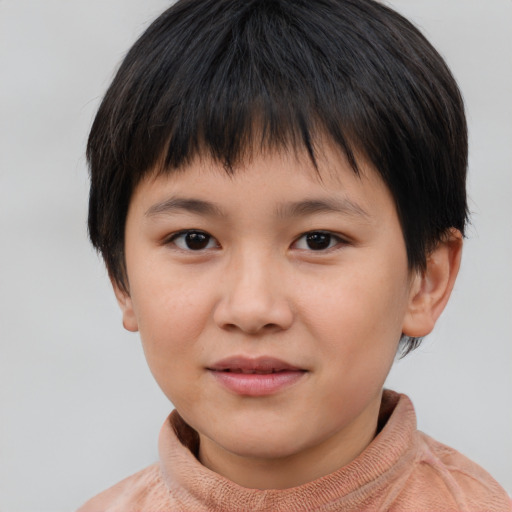 Joyful asian child female with short  brown hair and brown eyes