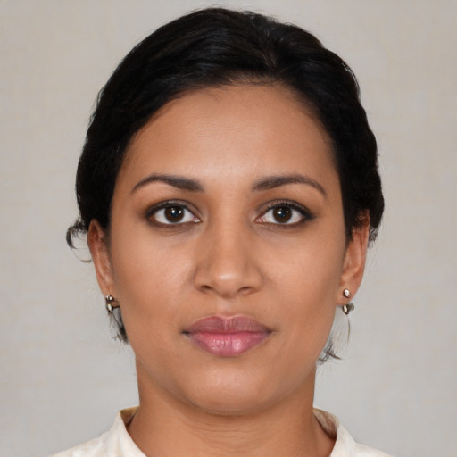Neutral latino young-adult female with medium  black hair and brown eyes