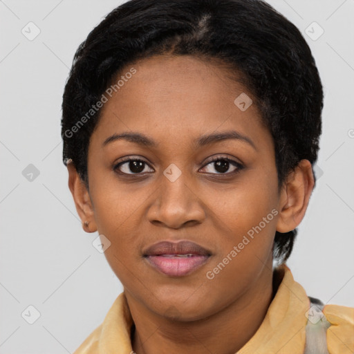 Joyful black young-adult female with short  black hair and brown eyes