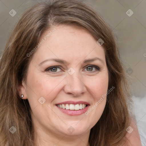 Joyful white adult female with medium  brown hair and brown eyes