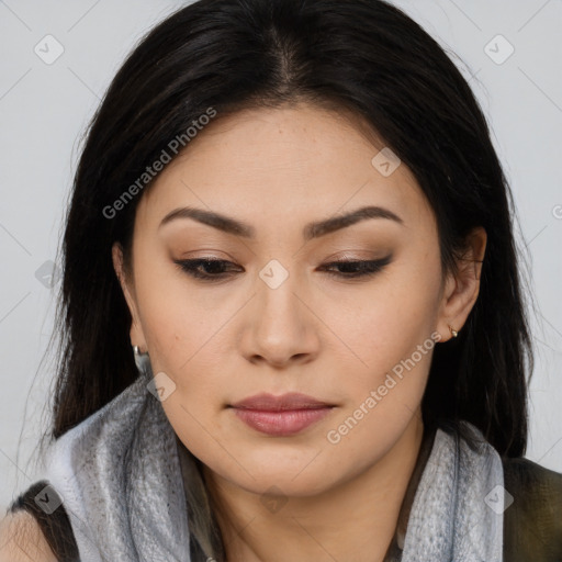 Joyful asian young-adult female with long  brown hair and brown eyes