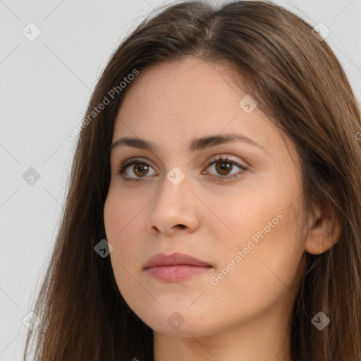 Neutral white young-adult female with long  brown hair and brown eyes