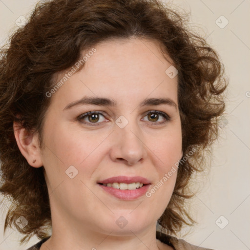 Joyful white young-adult female with medium  brown hair and green eyes