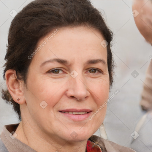 Joyful white adult female with short  brown hair and brown eyes