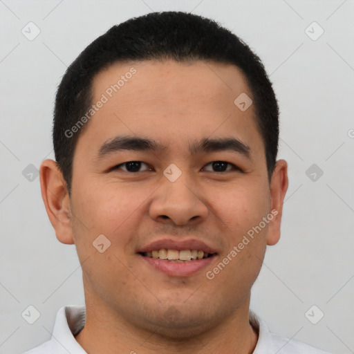 Joyful latino young-adult male with short  brown hair and brown eyes