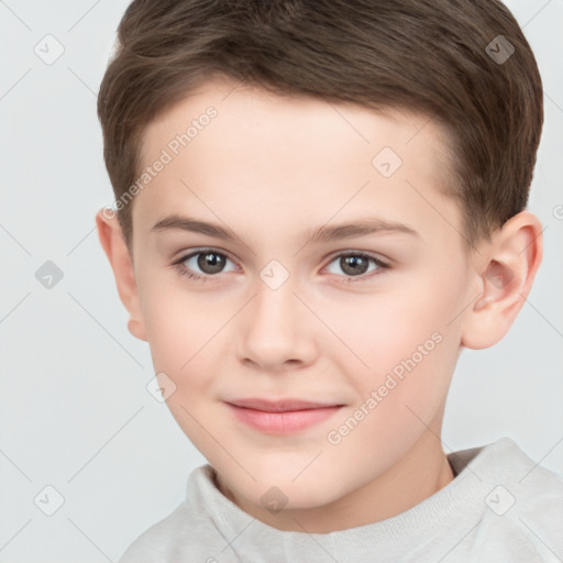 Joyful white child male with short  brown hair and brown eyes