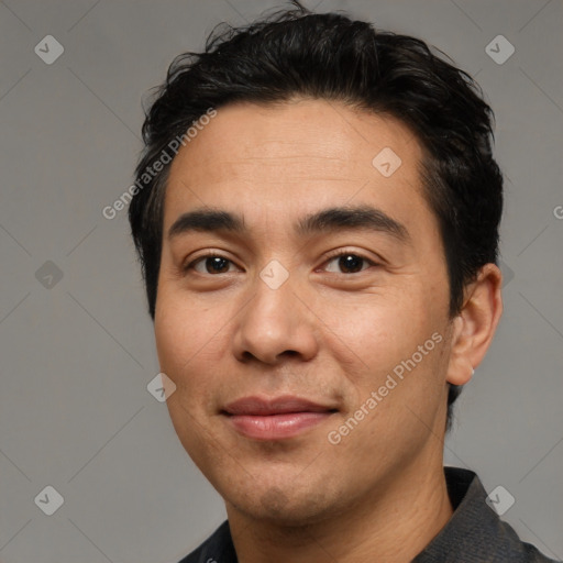 Joyful white young-adult male with short  black hair and brown eyes