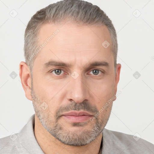 Neutral white adult male with short  brown hair and brown eyes