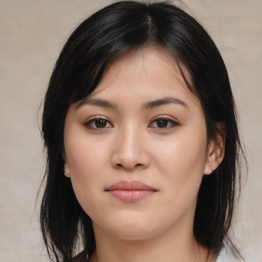 Joyful white young-adult female with medium  black hair and brown eyes