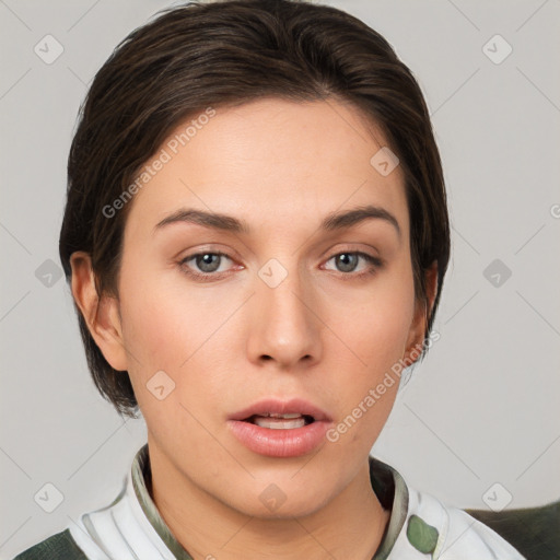 Neutral white young-adult female with medium  brown hair and brown eyes