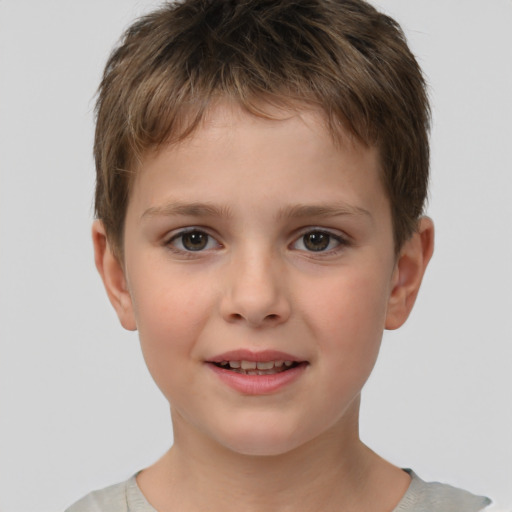 Joyful white child male with short  brown hair and brown eyes