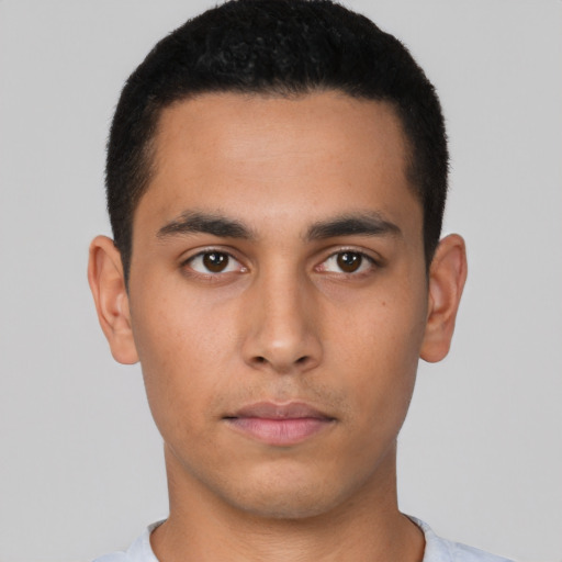 Neutral latino young-adult male with short  black hair and brown eyes