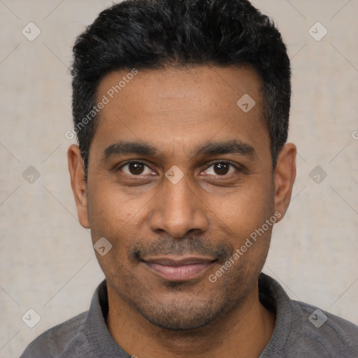 Joyful latino young-adult male with short  black hair and brown eyes