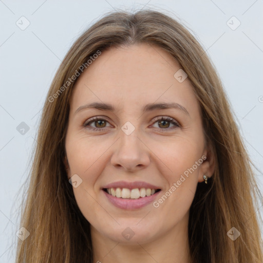 Joyful white young-adult female with long  brown hair and brown eyes