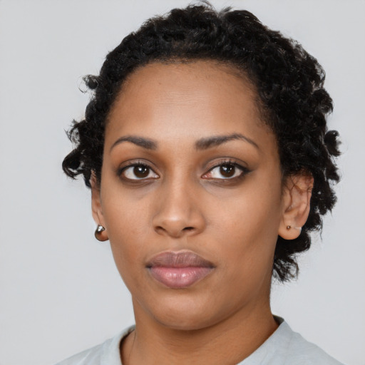 Neutral black young-adult female with short  black hair and brown eyes