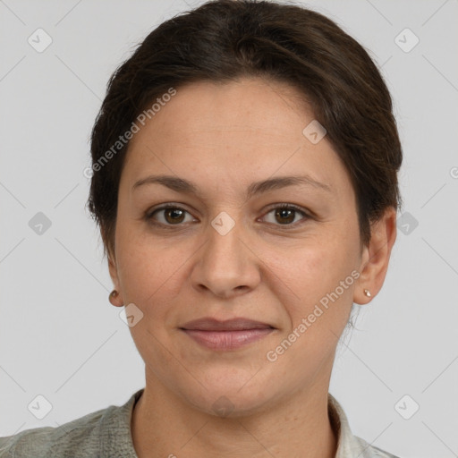 Joyful white adult female with short  brown hair and brown eyes