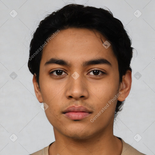 Neutral latino young-adult male with short  black hair and brown eyes