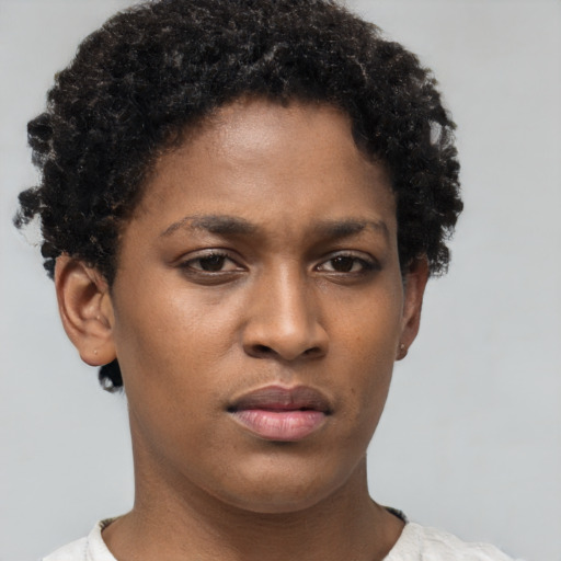 Neutral black young-adult female with short  brown hair and brown eyes