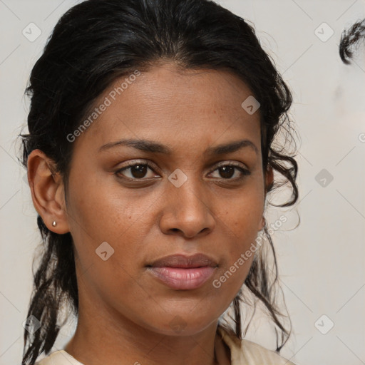 Joyful black young-adult female with medium  brown hair and brown eyes