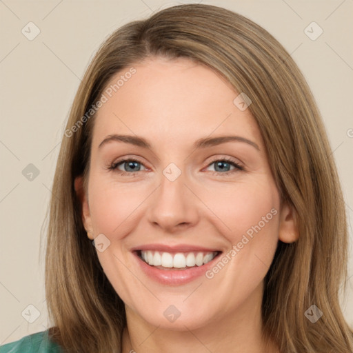 Joyful white young-adult female with long  brown hair and green eyes