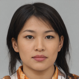 Neutral asian young-adult female with medium  brown hair and brown eyes