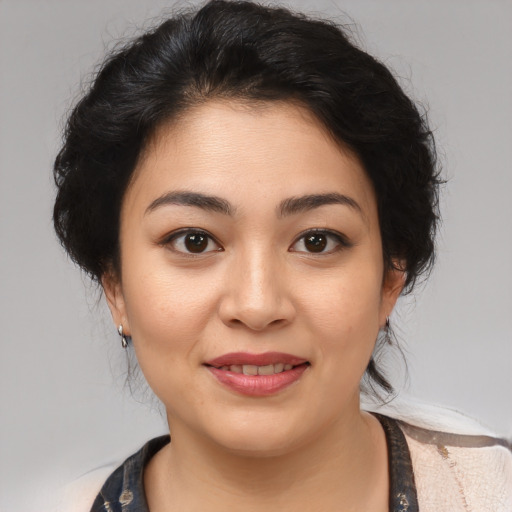 Joyful asian young-adult female with medium  brown hair and brown eyes