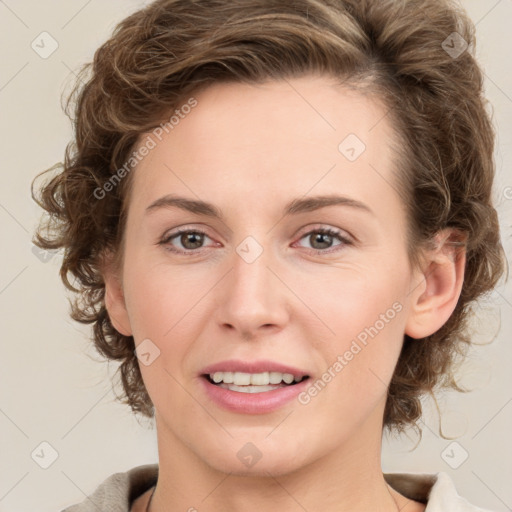 Joyful white young-adult female with medium  brown hair and green eyes