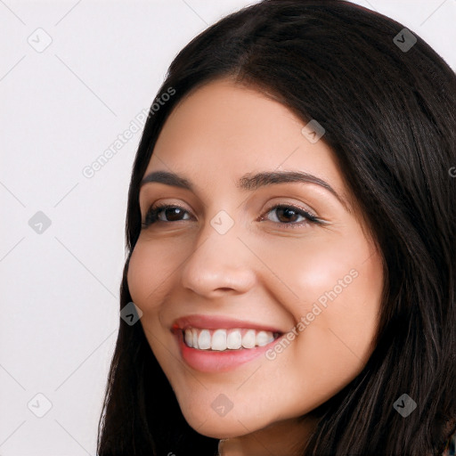 Joyful white young-adult female with long  black hair and brown eyes