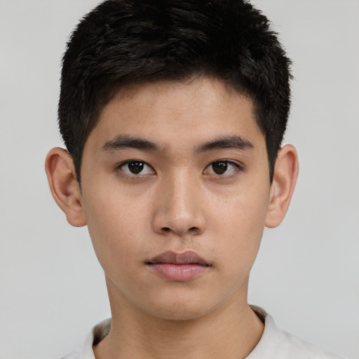 Neutral asian young-adult male with short  brown hair and brown eyes
