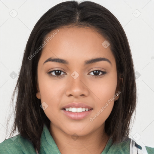 Joyful latino young-adult female with long  brown hair and brown eyes