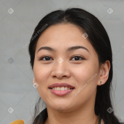 Joyful asian young-adult female with medium  brown hair and brown eyes