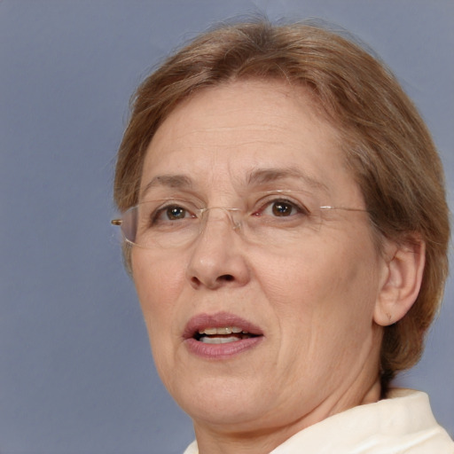 Joyful white middle-aged female with medium  brown hair and brown eyes