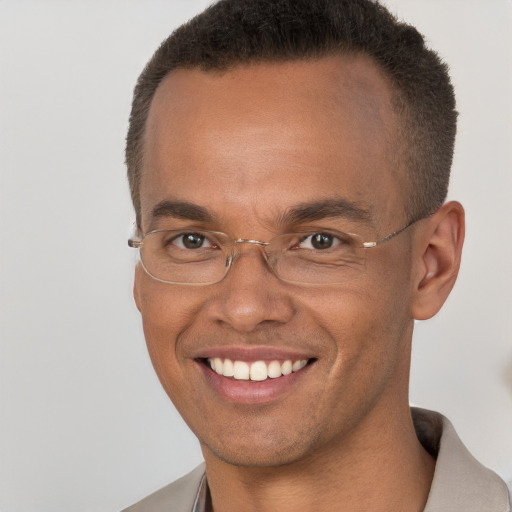 Joyful white adult male with short  brown hair and brown eyes