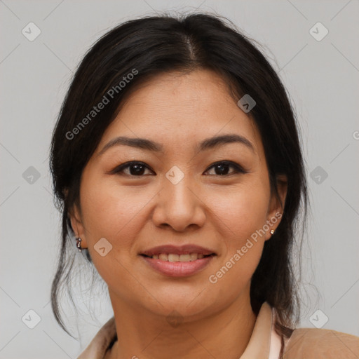 Joyful asian young-adult female with medium  brown hair and brown eyes