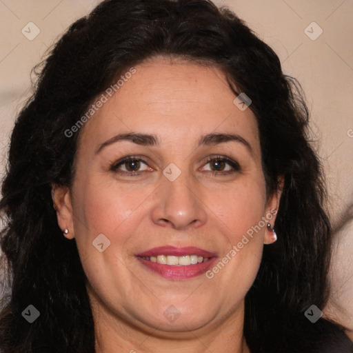 Joyful white adult female with long  brown hair and brown eyes