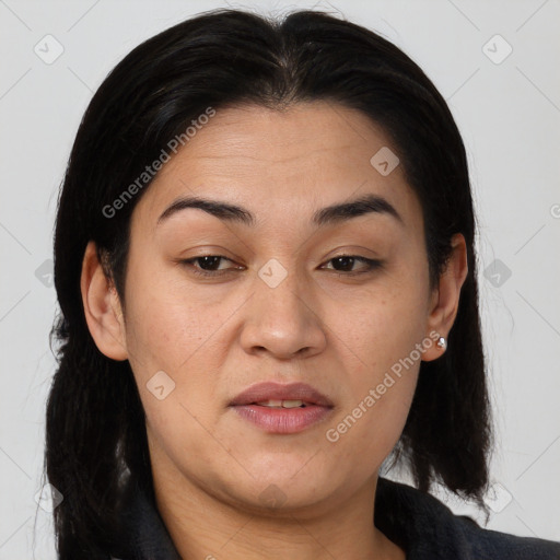 Joyful asian young-adult female with long  brown hair and brown eyes