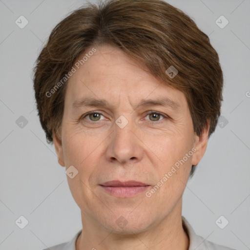 Joyful white adult male with short  brown hair and grey eyes