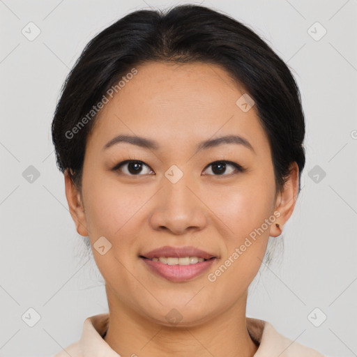 Joyful asian young-adult female with short  brown hair and brown eyes