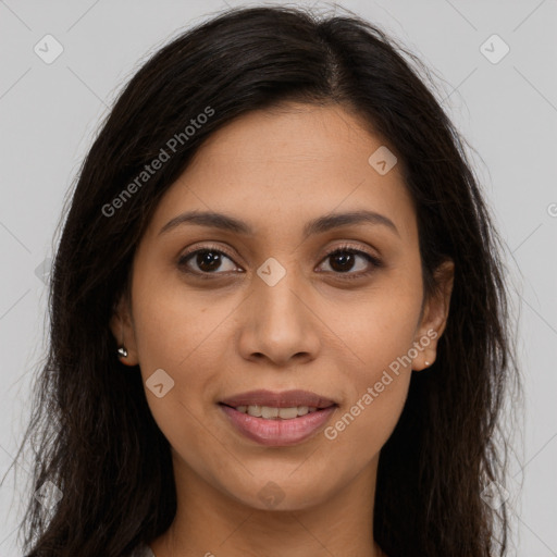 Joyful latino young-adult female with long  brown hair and brown eyes