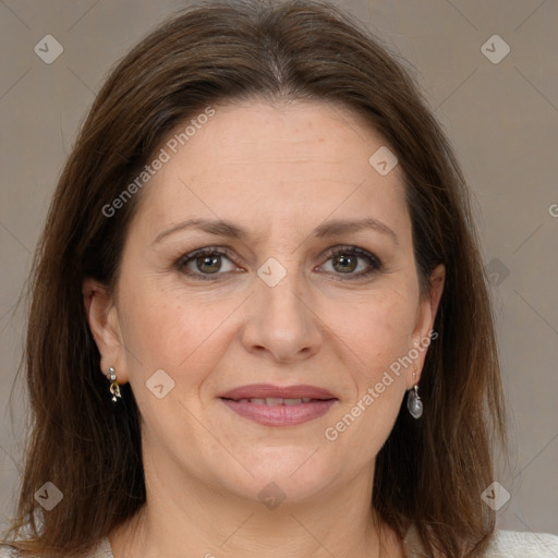 Joyful white adult female with medium  brown hair and brown eyes